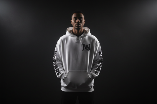 Person wearing a white hoodie with branding on a black background