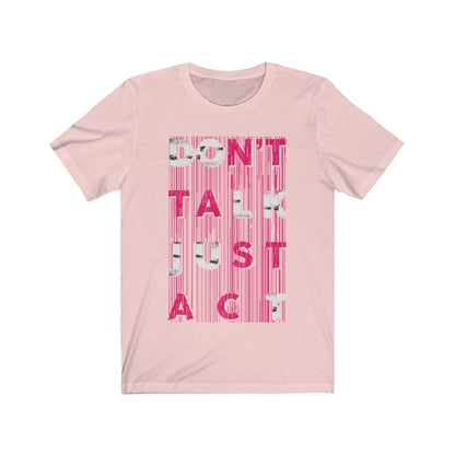 Pink t-shirt with text 'DON'T TALK JUST ACT' on a white background
