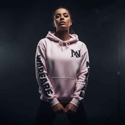 Person wearing a pink hoodie with branding on a dark background