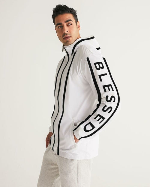 Man wearing a white jacket with 'BLESSED' text on a plain background