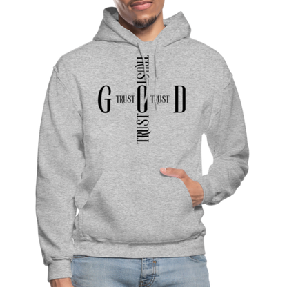 Person wearing a gray hoodie with text design on a white background