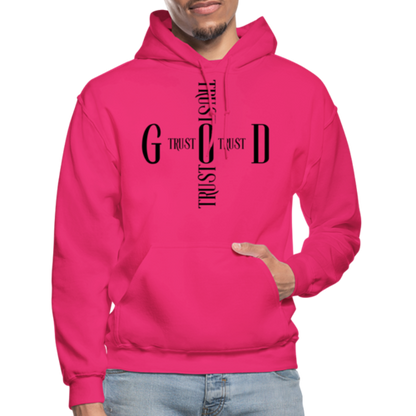 Person wearing a pink hoodie with black text design on a white background
