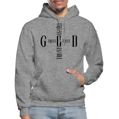 Person wearing a gray hoodie with text design on a white background